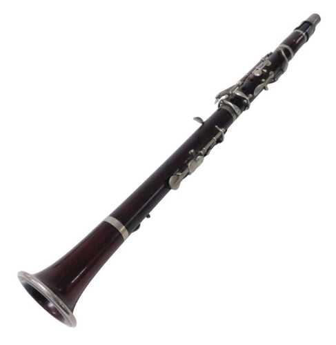 A rosewood clarinet, 63.5cm long.