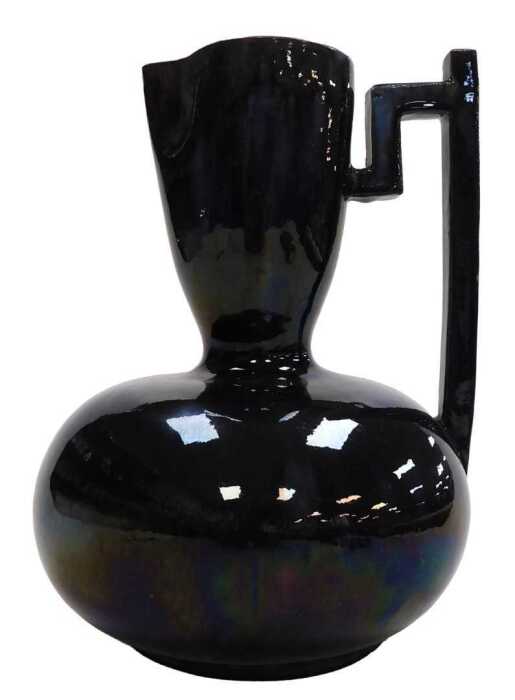 A late 19thC Samuel Lear Arts and Crafts Japanese style pitcher, designed by Christopher Dresser,...