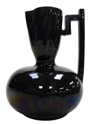 A late 19thC Samuel Lear Arts and Crafts Japanese style pitcher, designed by Christopher Dresser,...
