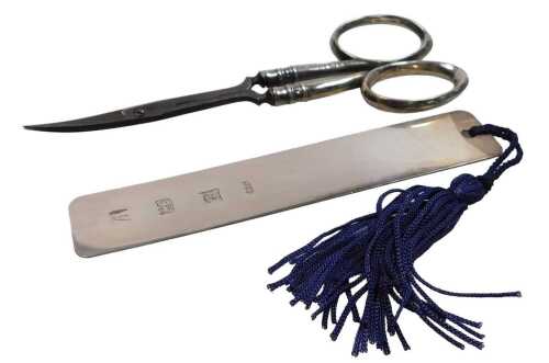 An Elizabeth II silver bookmark, engraved William, cased, Birmingham 1998, 0.38oz, together with...