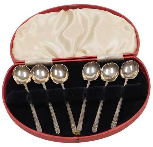 A set of six George V Art Deco silver coffee spoons, cased, Sheffield 1932, 1.17oz.