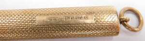 A 9ct gold pencil holder, with engine turned decoration, gold weight 5.5g. - 3