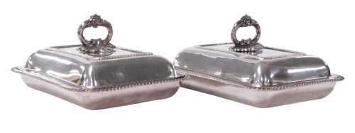 A pair of 19thC silver plated entree dishes and covers, with detachable handles, and gadrooned...