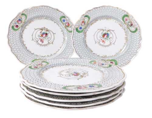 A set of eight 19thC Coalport porcelain plates, painted with reserves of flowers, within a gilt...