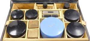 A mid 20thC black leather cased Helena Rubinstein cosmetics case, containing perfume bottles,... - 2