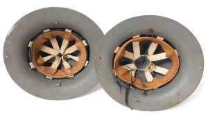 A pair of World War II Zuckerman Home Front military helmets, one dated 1941. - 2