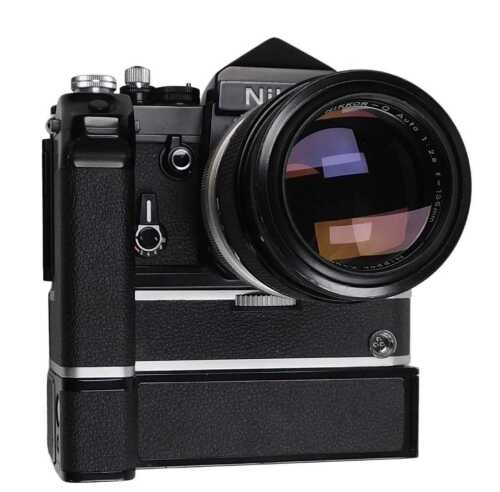 A Nikon F2 Photomatic camera, serial number 7422307, with a Nikon MD2 motor drive, serial number...