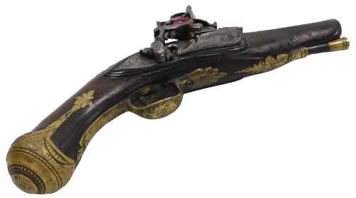 A 19thC flintlock pistol, with engraved lockplate and engraved inset brass furnishings and...