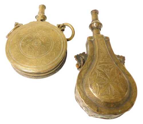 Two 19thC North African brass powder flasks, engraved with Islamic designs, both with two ring...