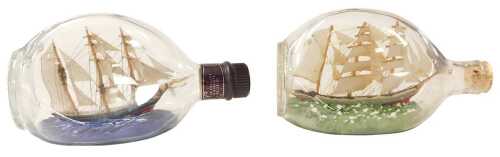 Two ships in bottle models, each model a three masted sailing ship, housed in Haig Dimple whisky...