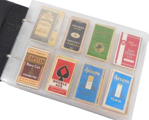 A collection of cigarette card packets, including Archers, Craven, Piccadilly, Park Royal, White...