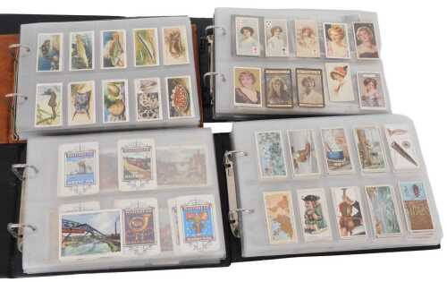 A collection of various cigarette cards, and Whitbread Brewery Ensigns, also including Film...
