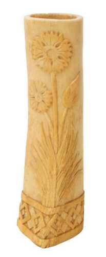 A WWI German Trench Art bone vase, carved with flowers and leaves, the base with a geometric...