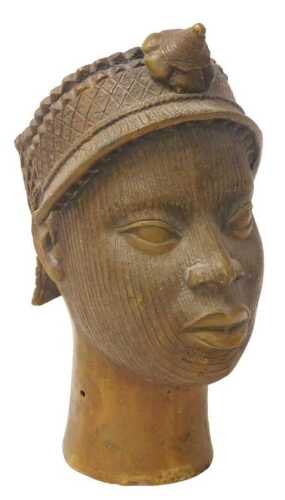 A Nigerian Benin tribal bust of a warrior wearing a headdress, 33cm high.