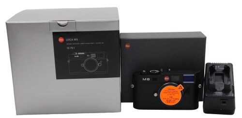 A Leica M8 digital camera, serial number 3110093, with original box, charger, battery packs,...