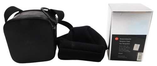 A Leica black leather camera case, with dual zip, and Leica neoprene case 18667, in original box....