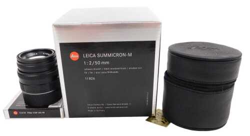 A Leica Summicion-M /22/50mm lens, (11826), with original box and paperwork, and an E39 UV...