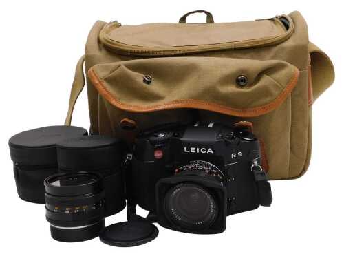 A Leica R9 SLR camera, serial number 2883479, with Elmarit-R 1:2.8/28 E55 lens, a Leica...