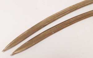 A pair of cavalry sabres, with a steel guard, and a wire bound black leather grip, curved blade... - 3