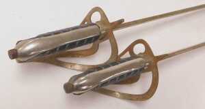 A pair of cavalry sabres, with a steel guard, and a wire bound black leather grip, curved blade... - 4