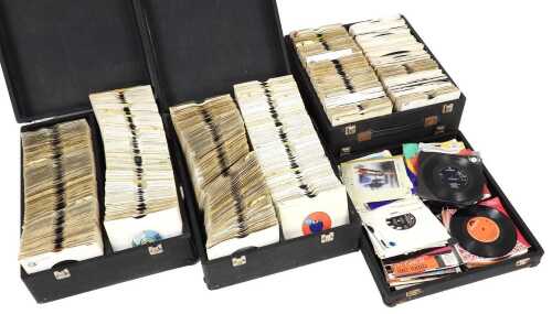 A collection of 45rpm 1970s and 80s disco records, housed in three hard carry cases with...