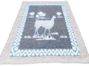 A late 20thC South African llama wool blanket, decorated with a llama and trees, within a...