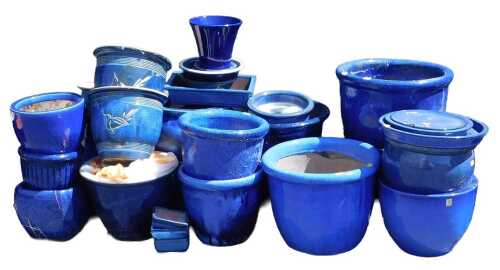 A group of blue glaze plant pots, differing size and design.