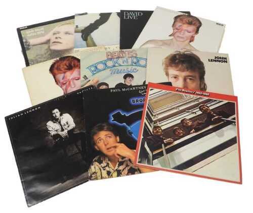 A small collection of LP records, including The Beatles, John Lennon, Julian Lennon, and David...