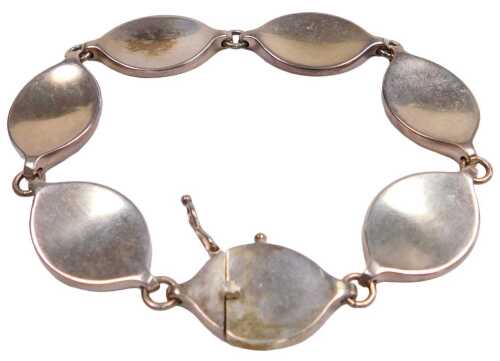 A Georg Jensen silver bracelet, designed by Flemming Eskilden, of six plain links, import marks,...