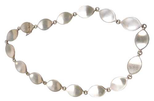 A George Jensen silver necklace, designed by Flemming Eskilden, of fifteen plain oval links,...