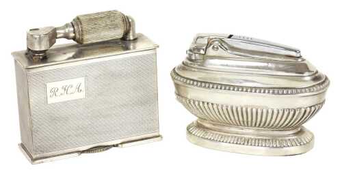 A McMurdo table cigarette lighter, of rectangular form with engine turned decoration and...