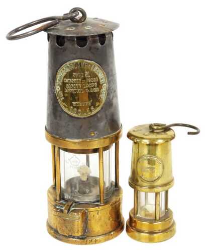 A Protector Lamp and Lighting Company Ltd Type SL miner's lamp, 12cm high, together with a...