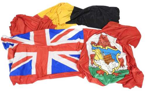A large Bermuda Ensign flag, printed with the emblem of the country, Union Jack on a red ground,...