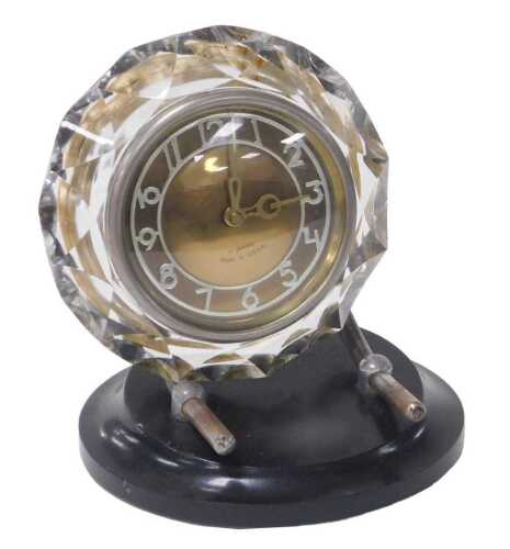 A Soviet era Magick mantel clock, the circular Arabic numeral dial with an eleven jewel movement,...