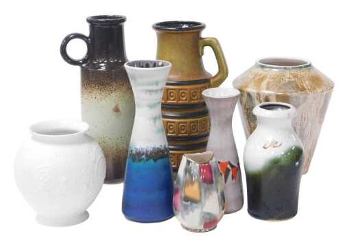 A group of pottery, to include a West German vase, with raised roundel banded decoration and...