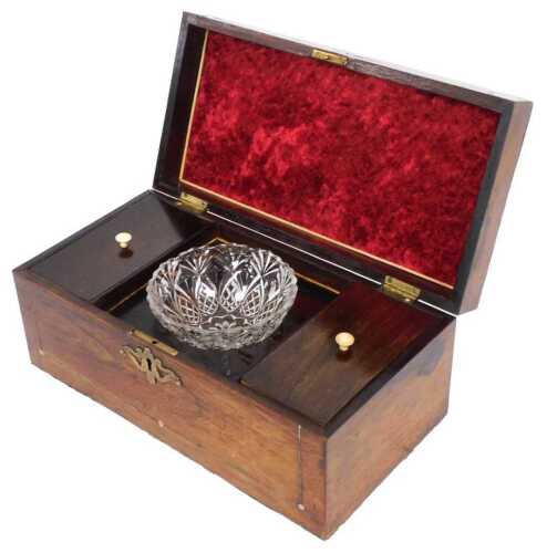 A 19thC rosewood and mother of pearl inlaid tea caddy, the hinged lid enclosing a recess...