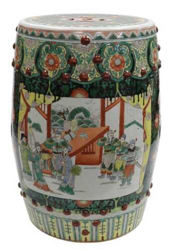 A late 20thC Chinese porcelain garden seat, of barrel form, with pierced decoration and famille...
