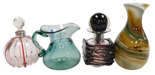 A Mdina glass scent bottle, with stopper, possibly matched, with overlaid amethyst glass...