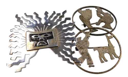 Three brooches, comprising a masked face brooch, marked Ecurdor 925, 4.5cm wide, and two similar...