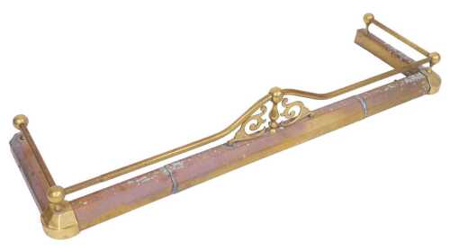 A late 19th/early 20thC brass fire fender, with scrolling front panel, 123cm wide.