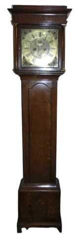 An early 19thC oak cased longcase clock, the square brass dial bearing Arabic and Roman numerals...