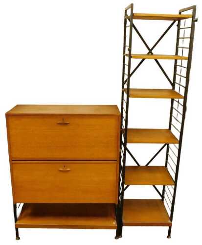 A 1970s Ladderax teak room unit, one section with a fall enclosing various recesses, above a...