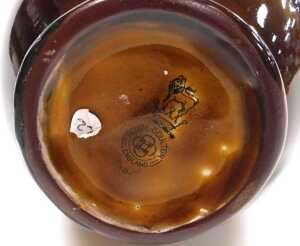 An early 20thC Royal Doulton pottery Dickens ware flagon, with a stopper, decorated with... - 6
