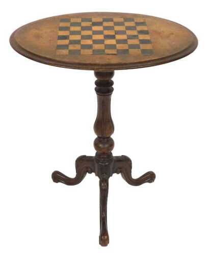 A 19thC mahogany games table, the oval top inlaid with a boxwood and ebony chess board, on a...