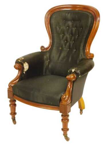 A Victorian mahogany spoonback show frame armchair.