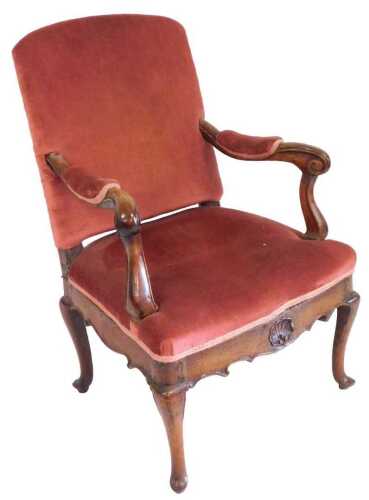 A Louis XV style mahogany fauteuil, the back, armrests and seats upholstered in red draylon,...