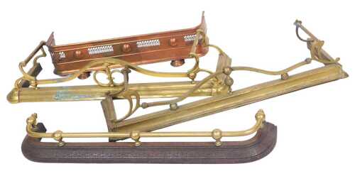 Three Victorian Art Nouveau fenders, and a further copper example. (4)
