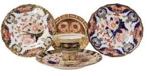 A group of 19thC Crown Derby Imari porcelain, including two plates decorated with flowers and...