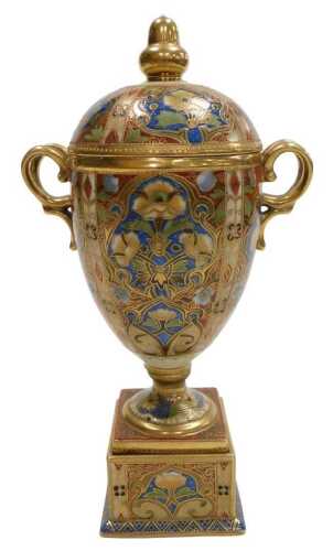 An early 20thC Japanese Noritake porcelain vase and cover, of twin handled form, decorated with...