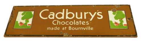 An early 20thC enamel Cadbury's Chocolates sign, made at Bournville, with two pictures of the...
